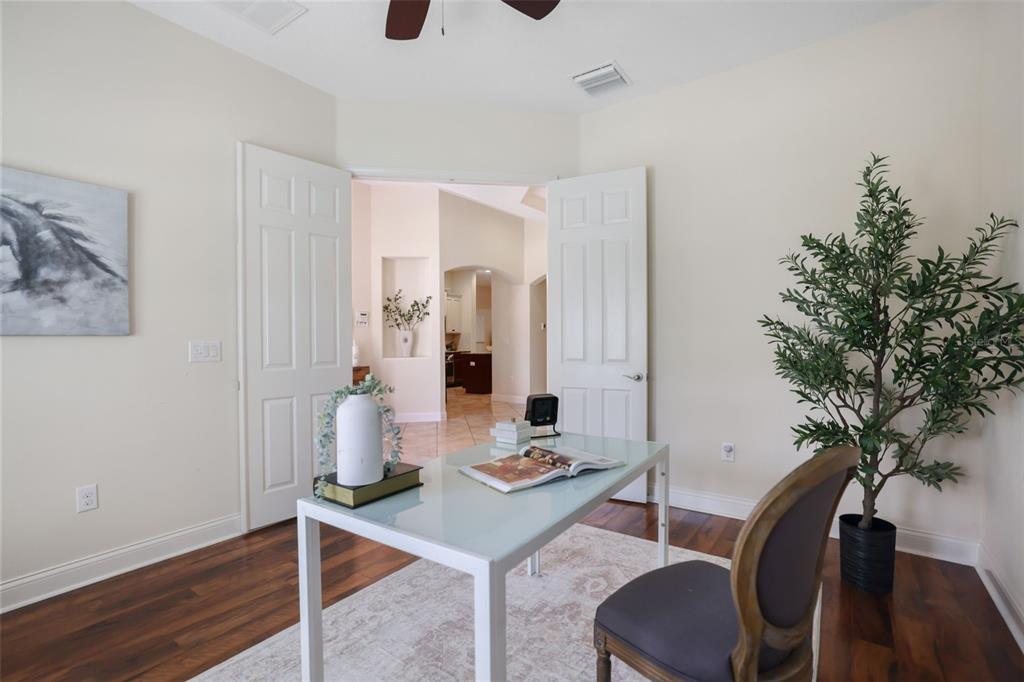 27211 Hawks Nest Circle Wesley Chapel, FL 33544 - Photo 7 of 58 a living room with furniture and wooden floor