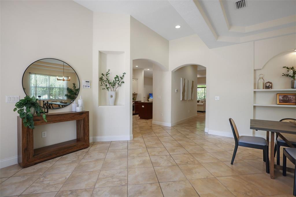 27211 Hawks Nest Circle Wesley Chapel, FL 33544 - Photo 8 of 58 a view of a livingroom with furniture and a fireplace