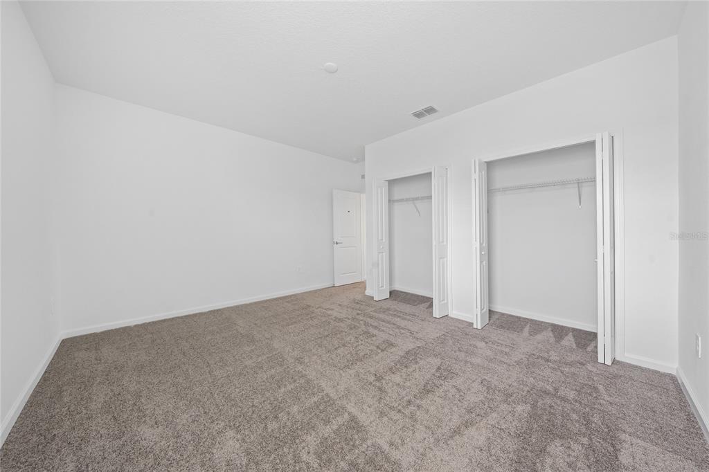 6061 Shavasana Road Clermont, FL 34714 - Photo 21 of 33 a view of an empty room