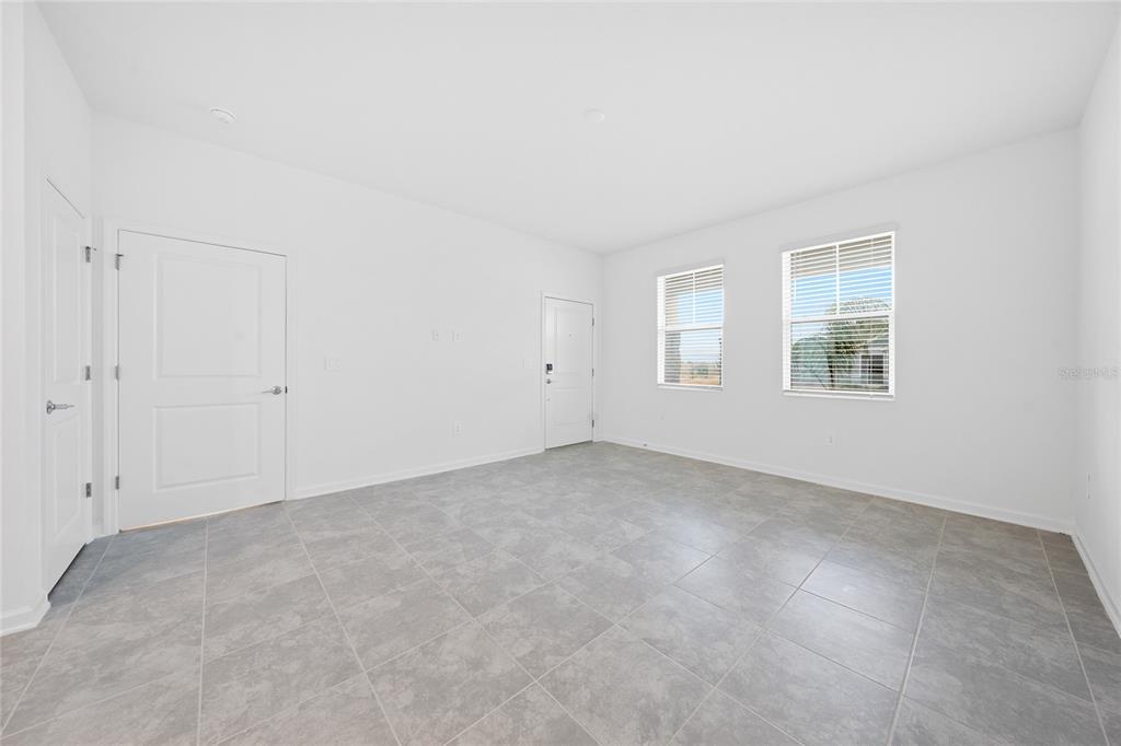 6061 Shavasana Road Clermont, FL 34714 - Photo 28 of 33 an empty room with windows