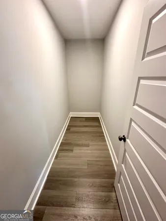 wooden floor with staircase