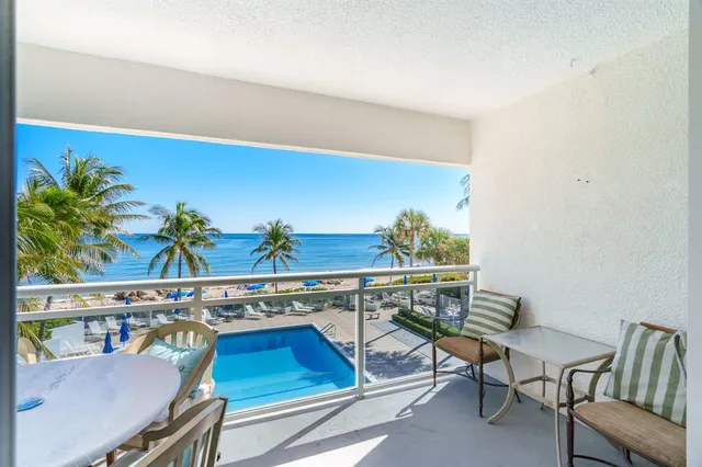 a view of a chairs and table in a room