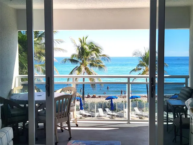 a view of water fountain from a window