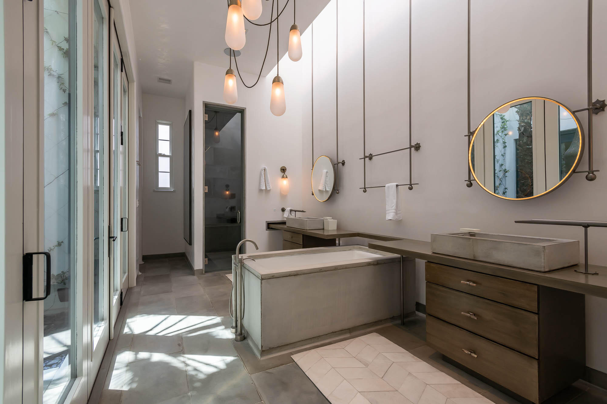 41 Kings Castle Ct Inlet Beach Inlet Beach, FL 32461 - Photo 11 of 28 a spacious bathroom with a double vanity sink and a mirror