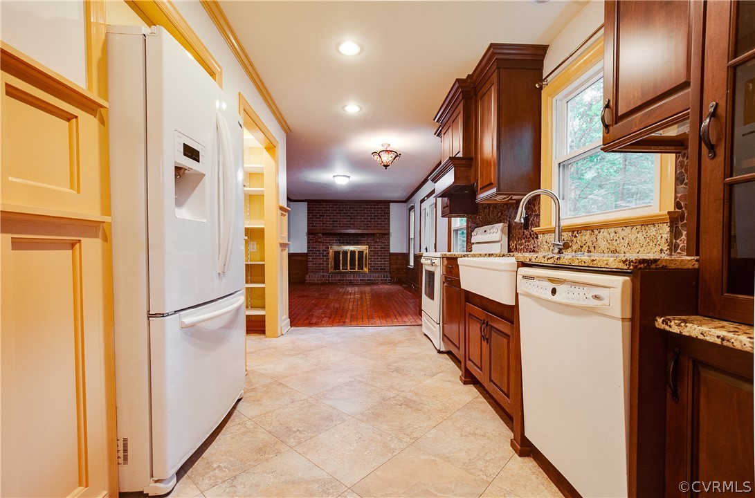 8403 Spring Meadow Road Richmond, VA 23235 - Photo 12 of 19 a kitchen with stainless steel appliances granite countertop a refrigerator and a stove