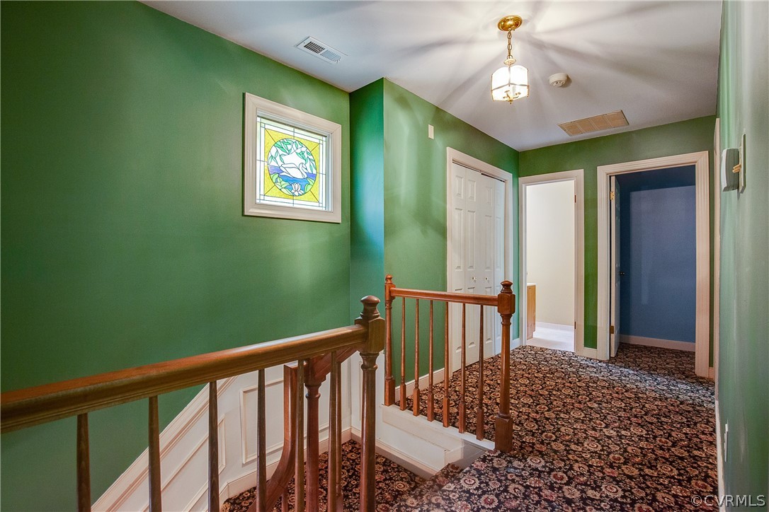 8403 Spring Meadow Road Richmond, VA 23235 - Photo 16 of 19 a view of a hallway with windows