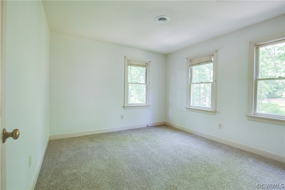8403 Spring Meadow Road Richmond, VA 23235 - Photo 18 of 19 an empty room with windows
