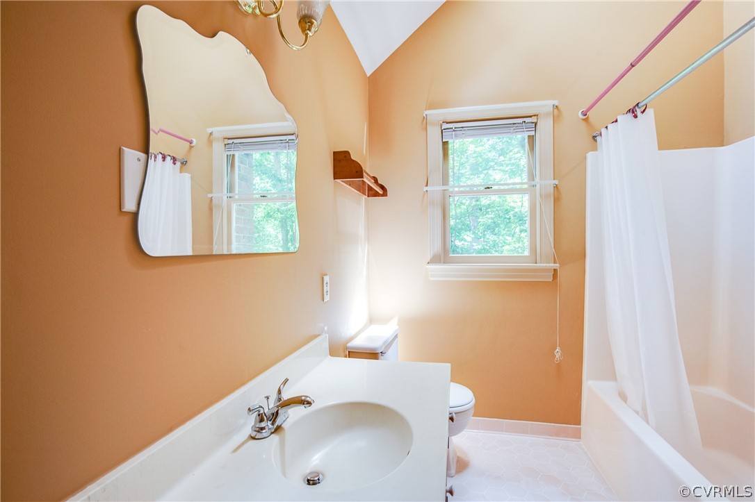 8403 Spring Meadow Road Richmond, VA 23235 - Photo 19 of 19 a bathroom with a sink a toilet and a tub