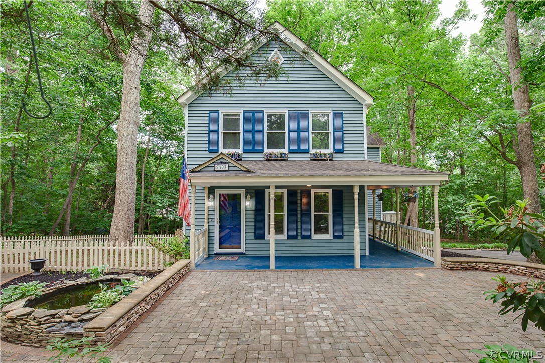 8403 Spring Meadow Road Richmond, VA 23235 - Photo 2 of 19 a house view with a garden space