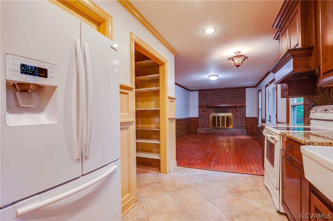 8403 Spring Meadow Road Richmond, VA 23235 - Photo 10 of 19 a view of a kitchen with a sink and cabinets