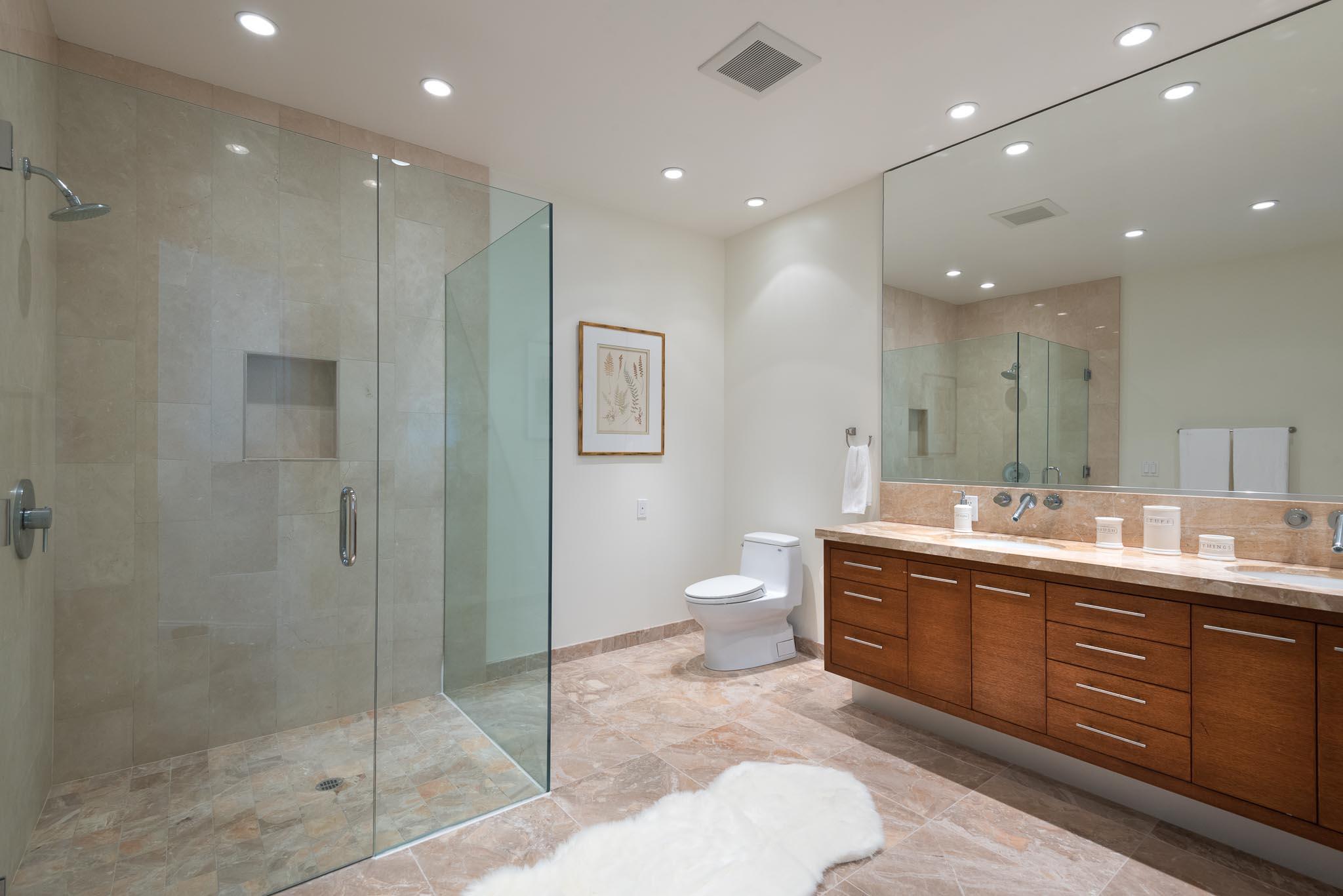 26 Seaview Drive Santa Barbara, CA 93108 - Photo 12 of 26 a spacious bathroom with a shower sink mirror and toilet