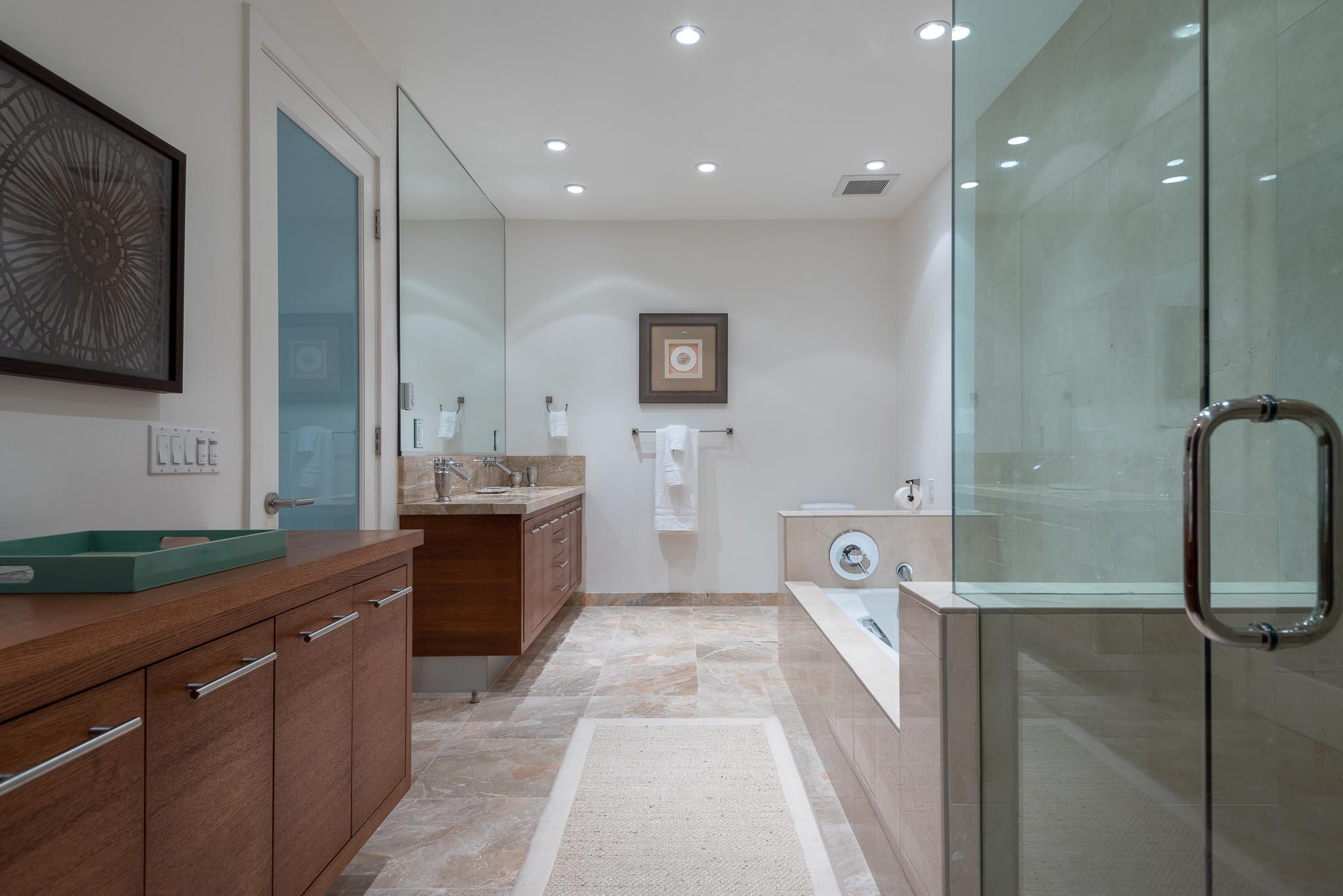 26 Seaview Drive Santa Barbara, CA 93108 - Photo 9 of 26 a bathroom with a double vanity sink a mirror and a shower