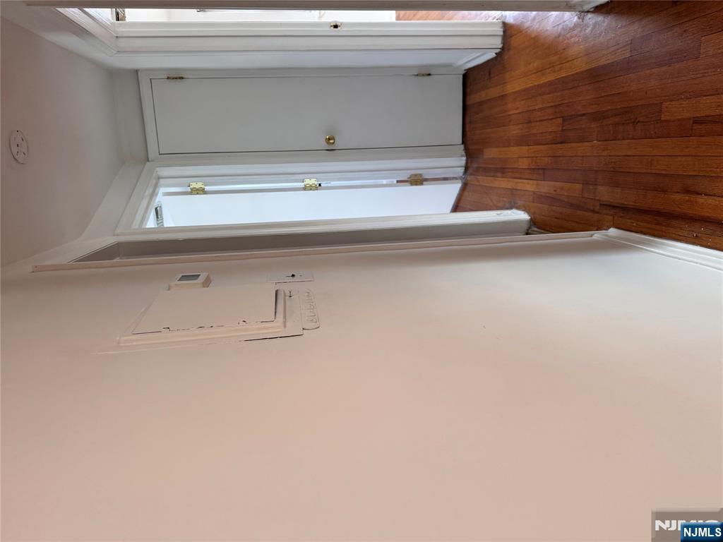 567 Boulevard, Unit 2 Hasbrouck Heights, NJ 07604 - Photo 5 of 7 a view of a hallway with wooden floor