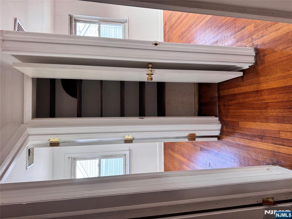 567 Boulevard, Unit 2 Hasbrouck Heights, NJ 07604 - Photo 6 of 7 a view of front door with wooden floor