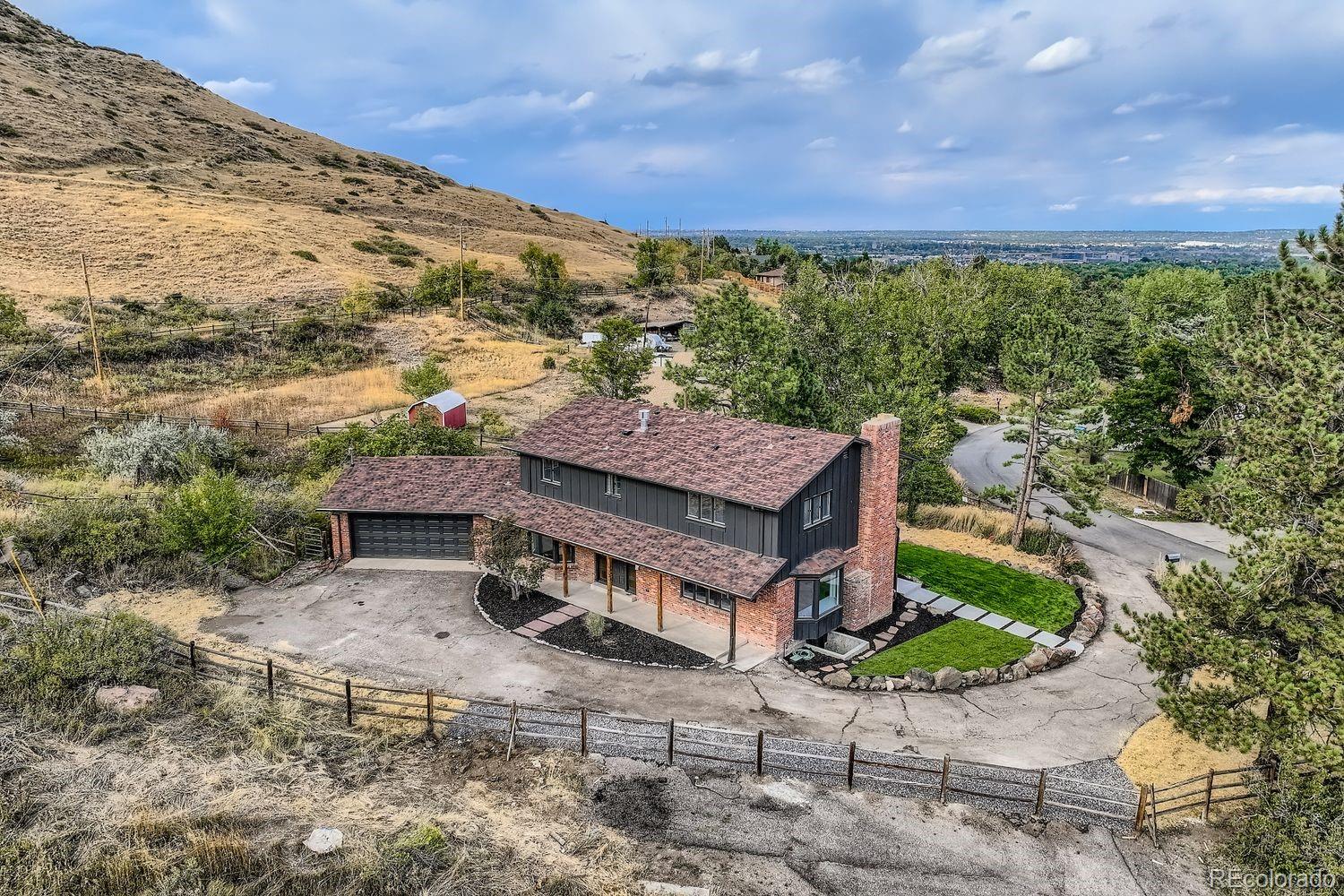 2127 Elderberry Road Golden, CO 80401 - Photo 39 of 43 a aerial view of a house with a yard