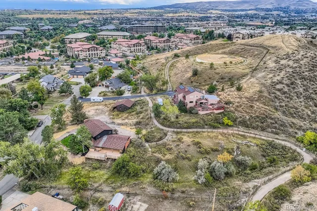 an aerial view of residential house with outdoor space