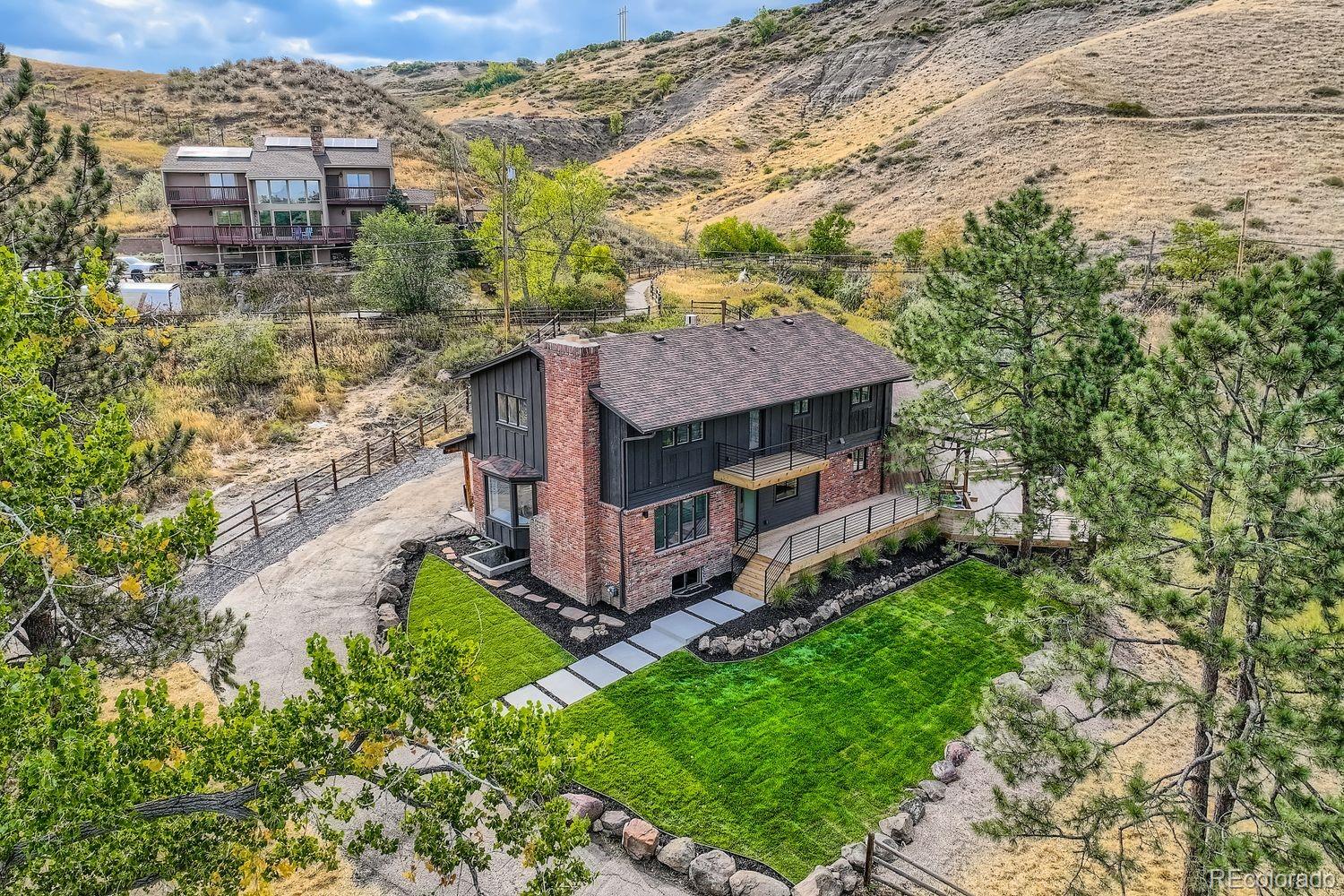2127 Elderberry Road Golden, CO 80401 - Photo 43 of 43 an aerial view of a house with a yard