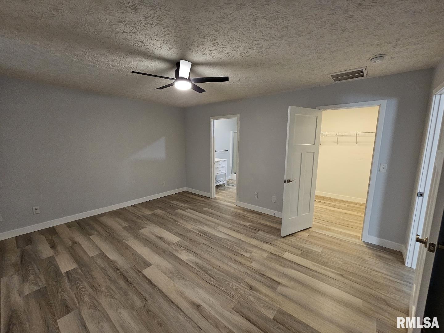 10457 Puckett Lane Mount Vernon, IL 62864 - Photo 22 of 25 wooden floor in an empty room