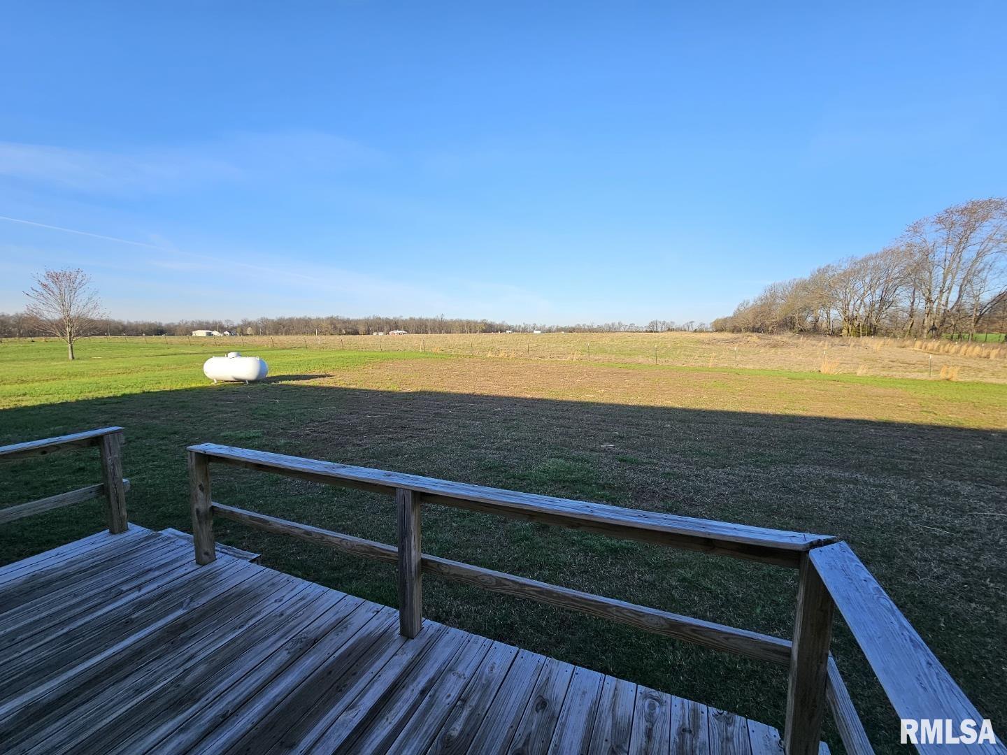 10457 Puckett Lane Mount Vernon, IL 62864 - Photo 7 of 25 a view of an ocean from a balcony
