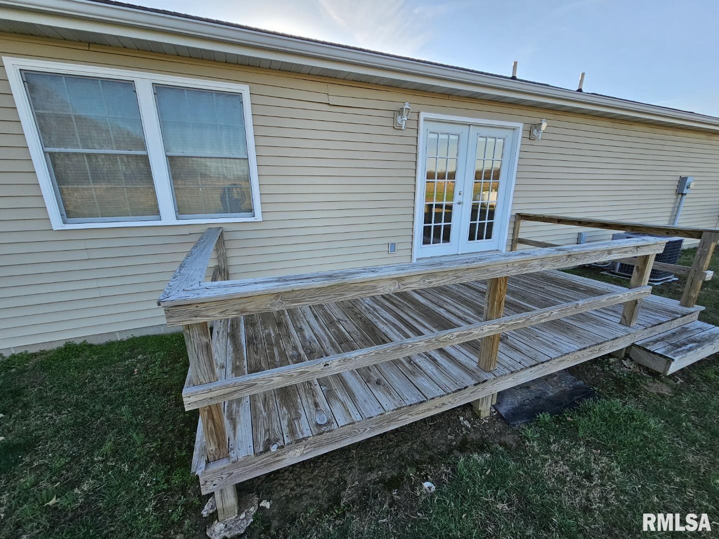 10457 Puckett Lane Mount Vernon, IL 62864 - Photo 8 of 25 a view of a house with pool and wooden deck