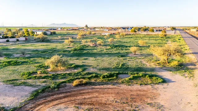 an aerial view of a houses with outdoor space
