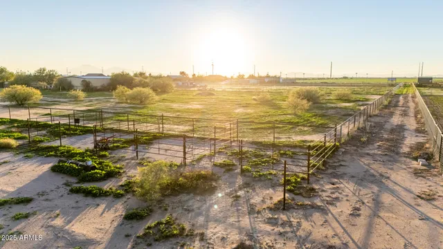 a view of a water pond with green space