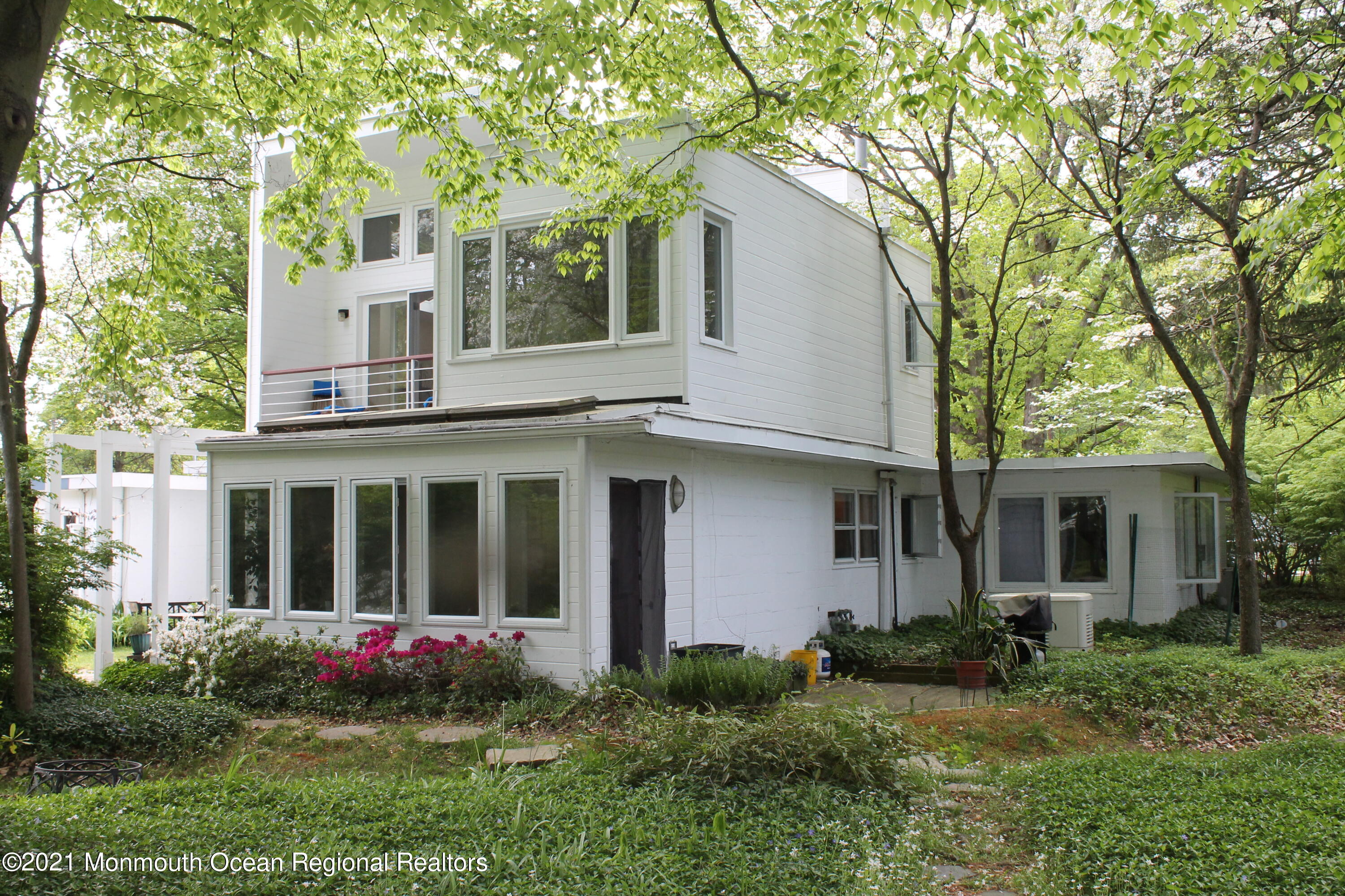 17 Pine Drive Roosevelt, NJ 08555 - Photo 2 of 22 a view of a white house with a yard and large tree