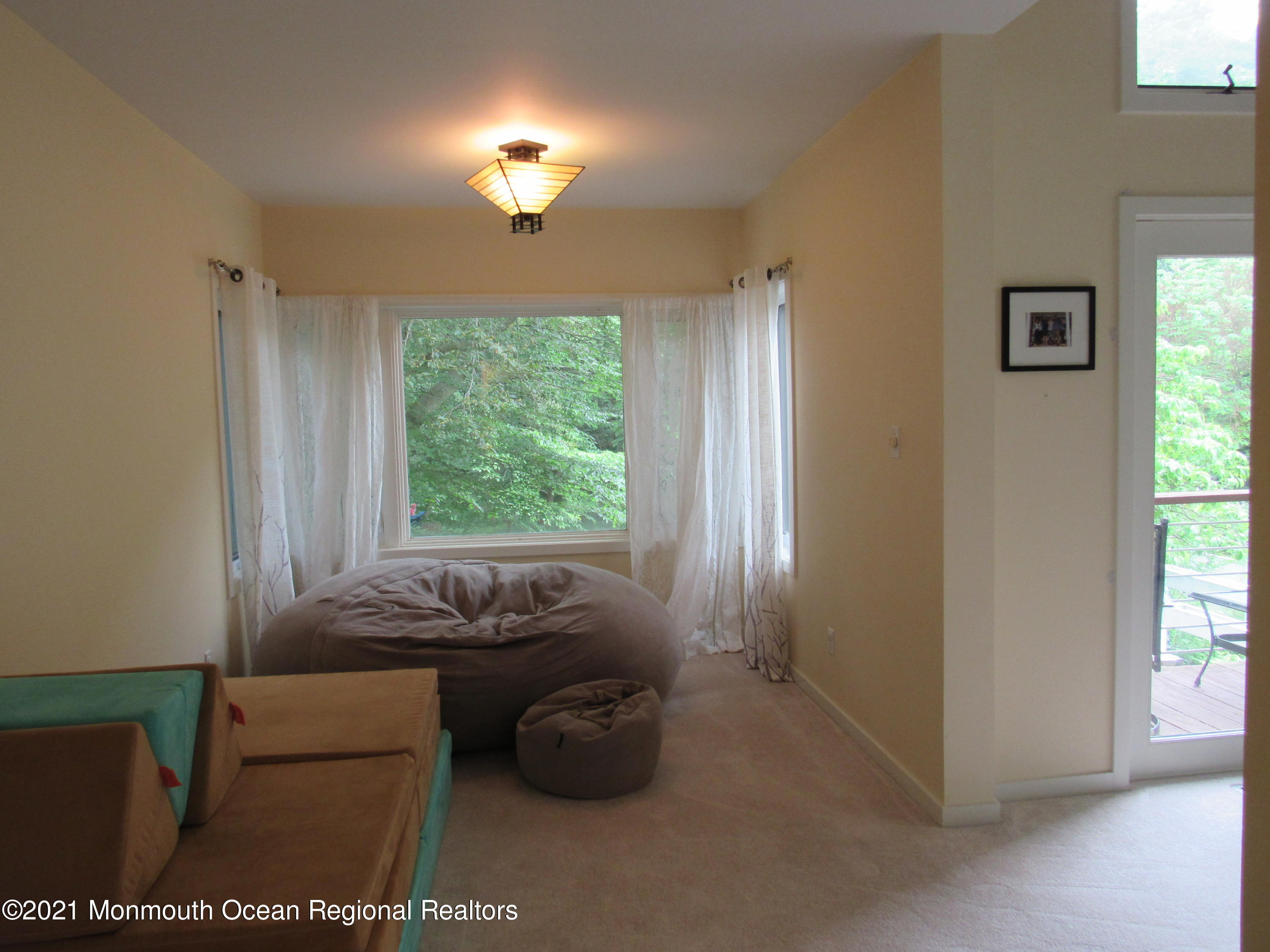 17 Pine Drive Roosevelt, NJ 08555 - Photo 22 of 22 a room with furniture and a window
