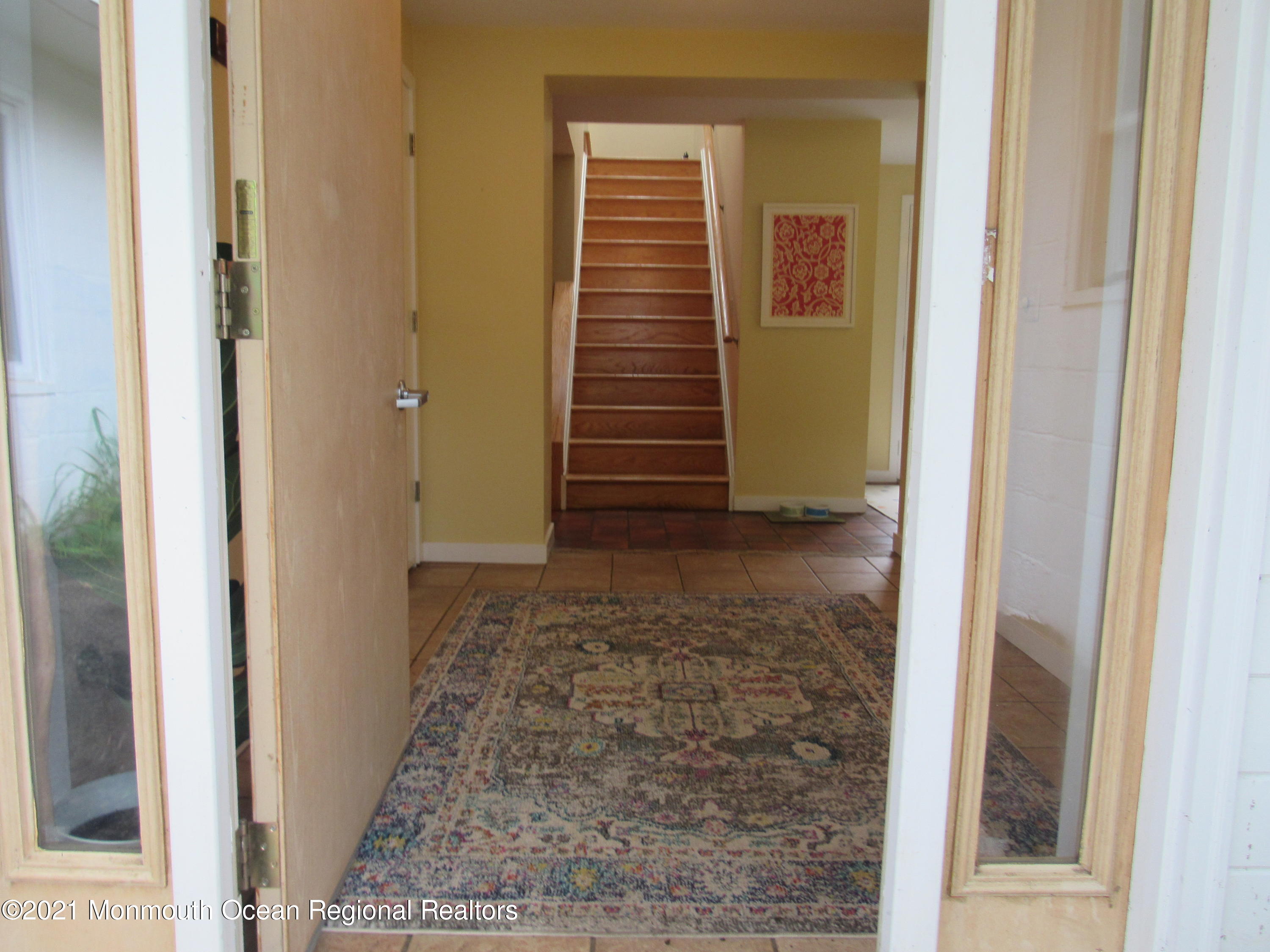 17 Pine Drive Roosevelt, NJ 08555 - Photo 7 of 22 a view of a hallway with stairs