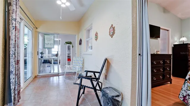 a view of a hallway and dining room
