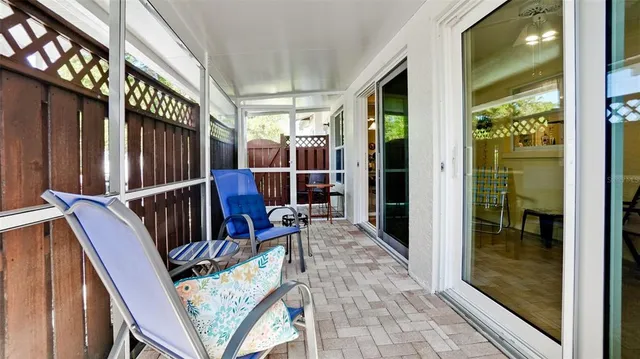 a bedroom with a bed and flat screen tv