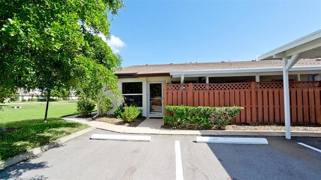 a view of a street with cars
