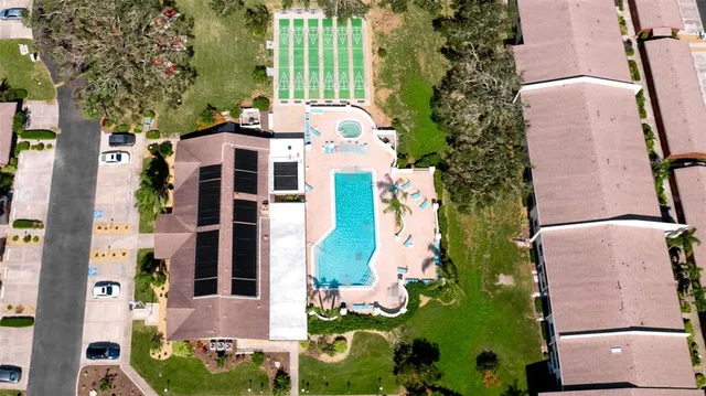 a view of swimming pool with a yard