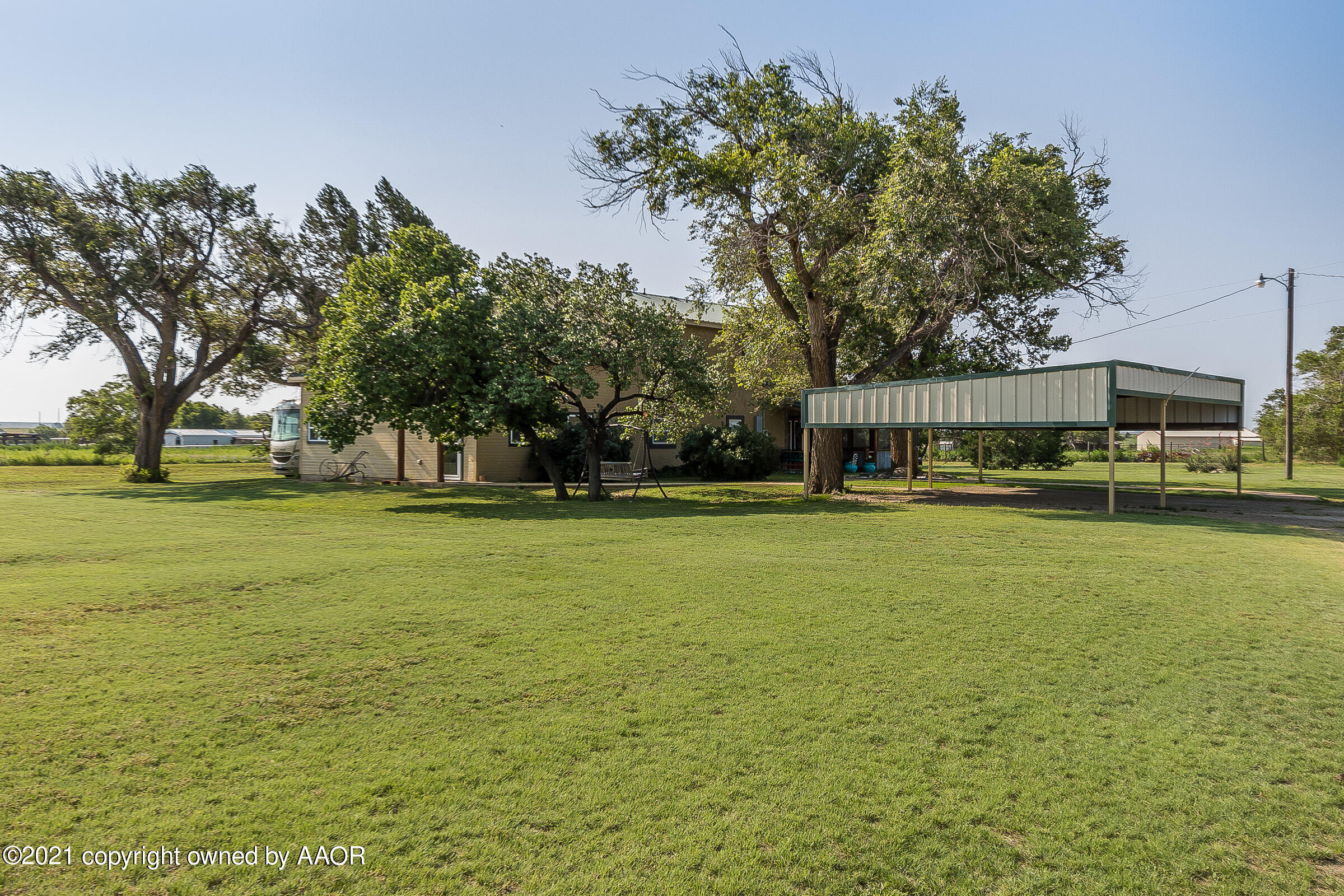 6951 West Cemetery Road Canyon, TX 79015 - Photo 2 of 39 002_Front and Covered Parking