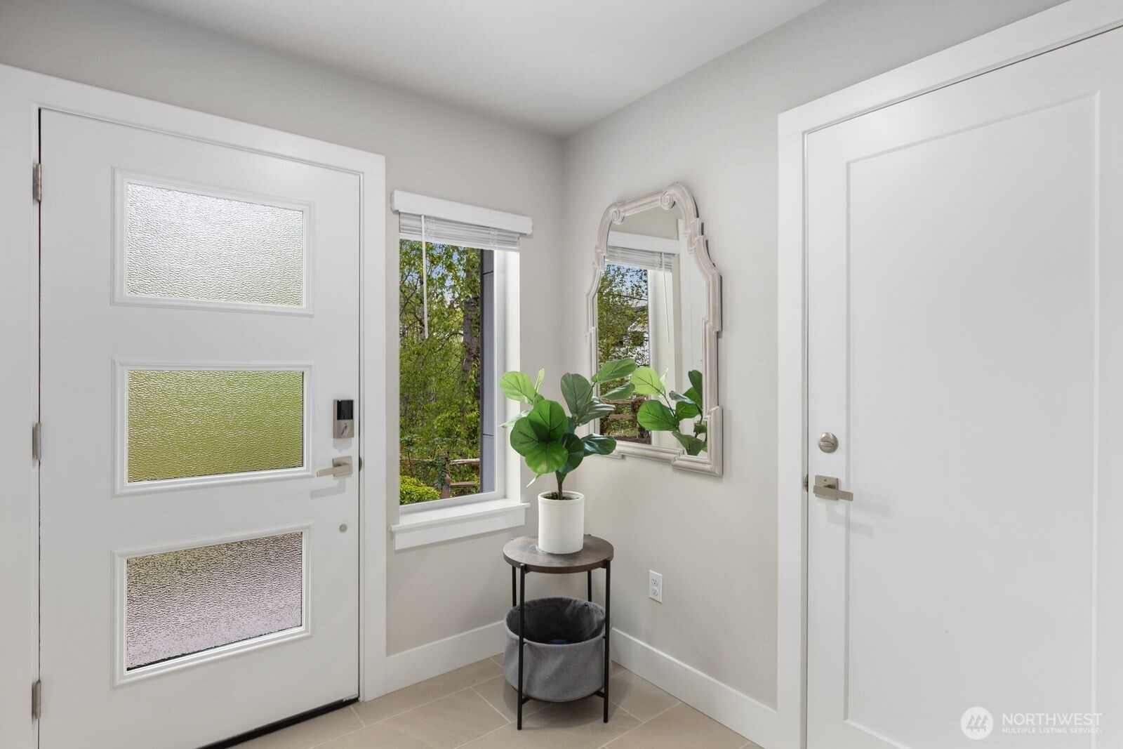 826 238th Place Southeast, Unit F Bothell, WA 98021 - Photo 22 of 39 a living room with furniture and a potted plant