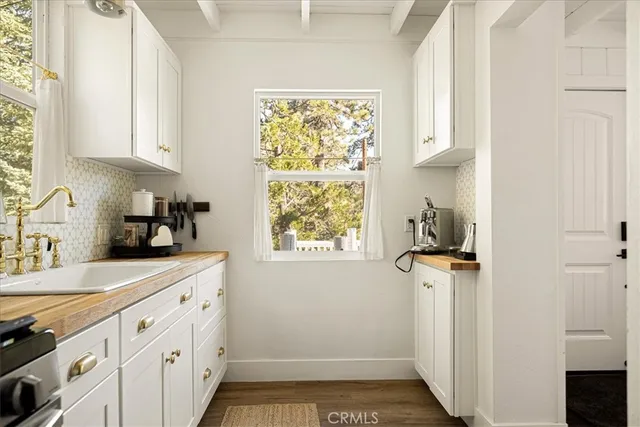 a room with window a sink and a window