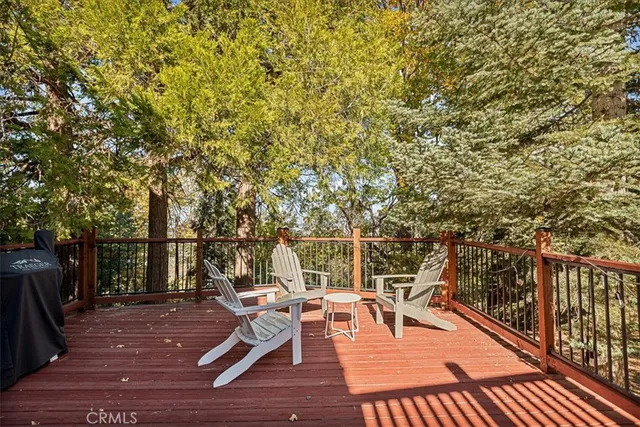a view of a chairs and tables on the deck