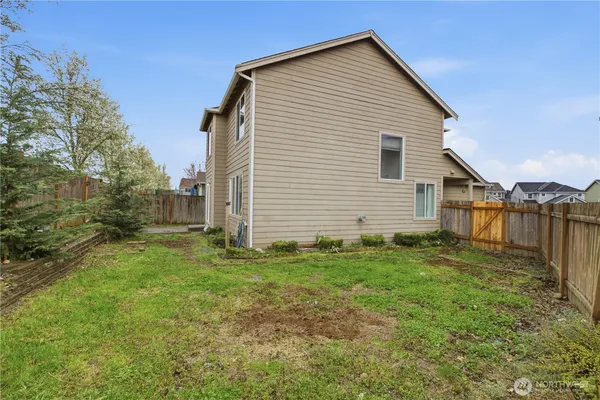 a view of backyard of house