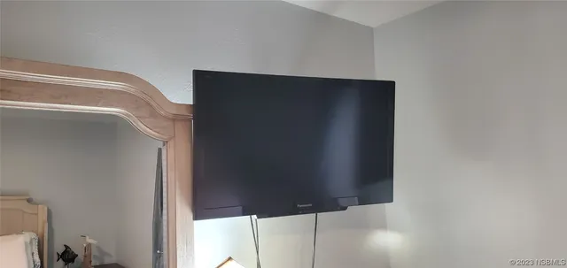 a lobby with furniture and window