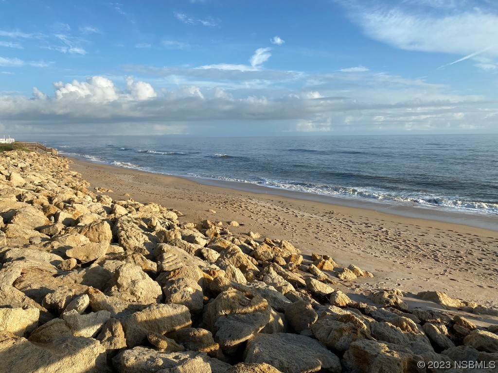 6727 Turtlemound Road, Unit 416 New Smyrna Beach, FL 32169 - Photo 62 of 67 a view of an ocean beach