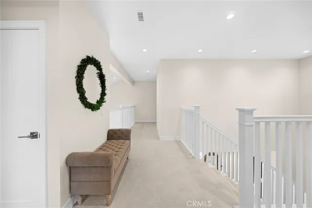 a view of entryway and hall with a window