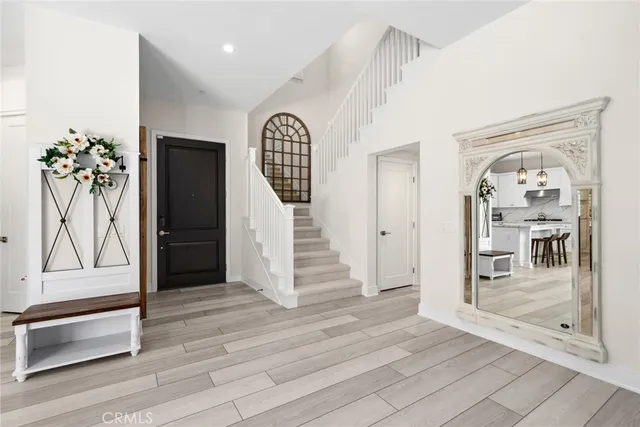 a view of entryway with wooden floor