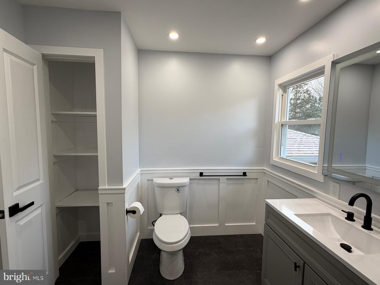 24 Rieck Avenue Millville, NJ 08332 - Photo 24 of 57 a bathroom with a sink toilet and window