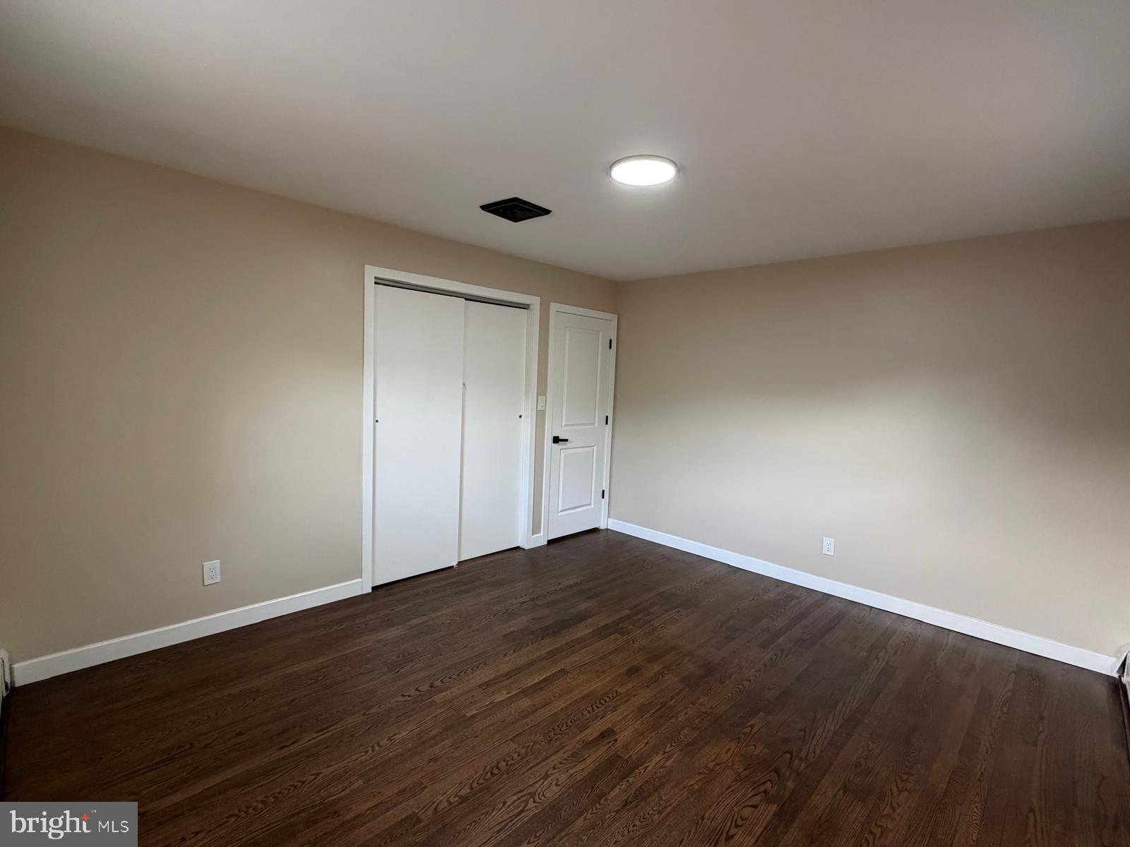 24 Rieck Avenue Millville, NJ 08332 - Photo 30 of 57 a view of an empty room with wooden floor