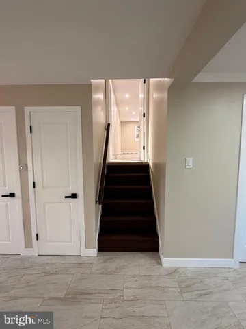 a bathroom with mirror sink and vanity