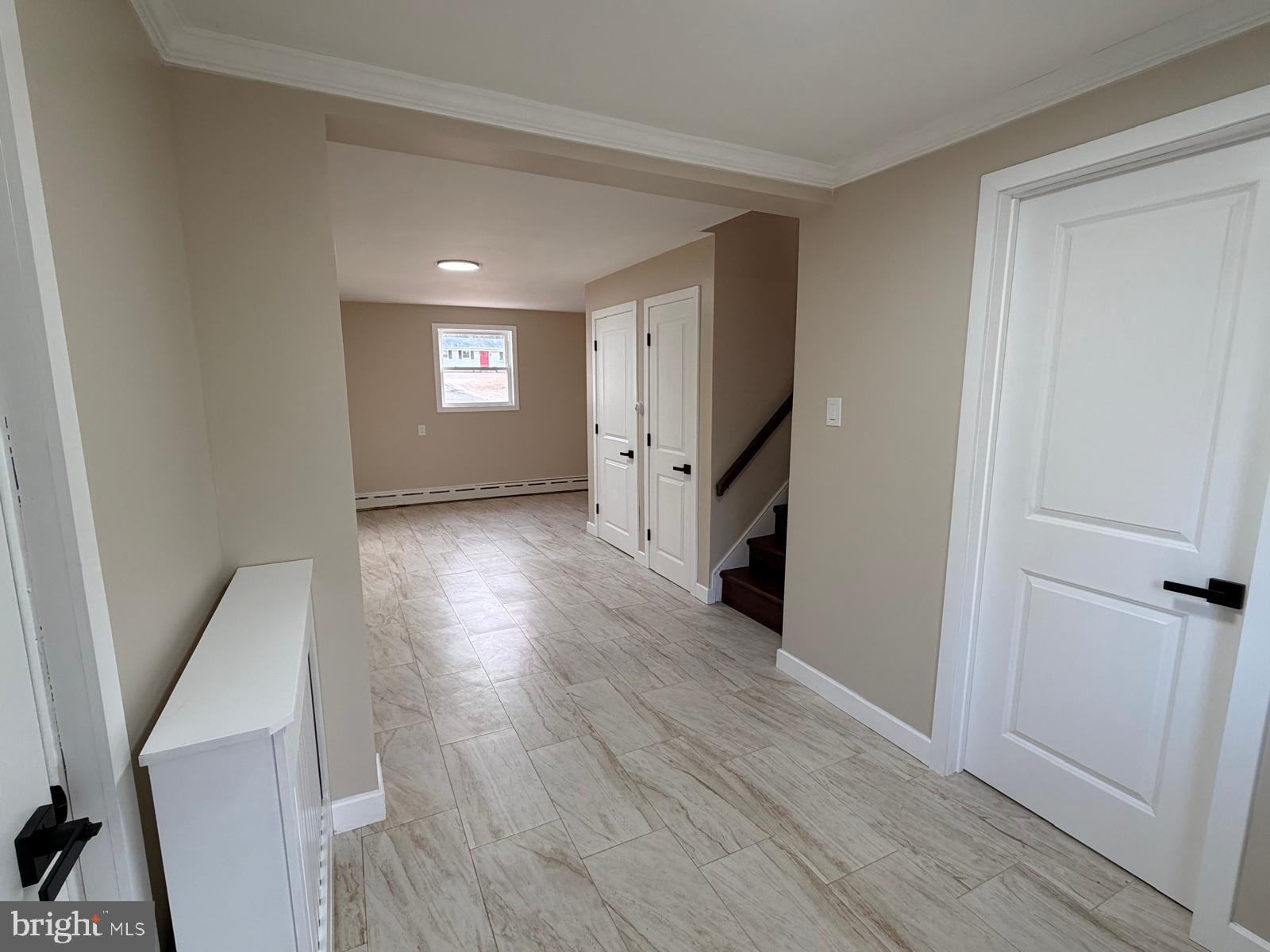 24 Rieck Avenue Millville, NJ 08332 - Photo 33 of 57 wooden floor in an empty room with a window