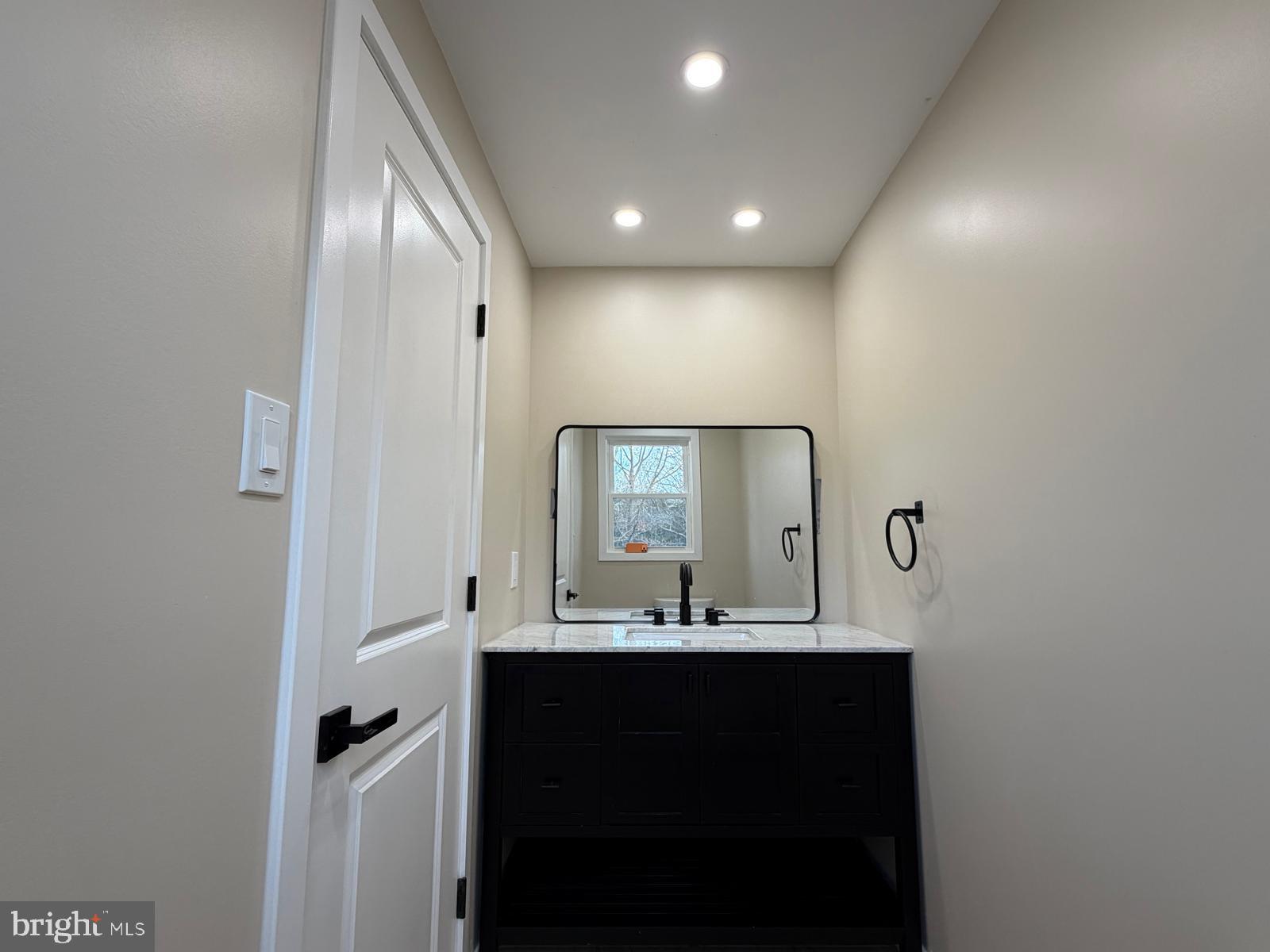 24 Rieck Avenue Millville, NJ 08332 - Photo 35 of 57 a bathroom with mirror sink and vanity