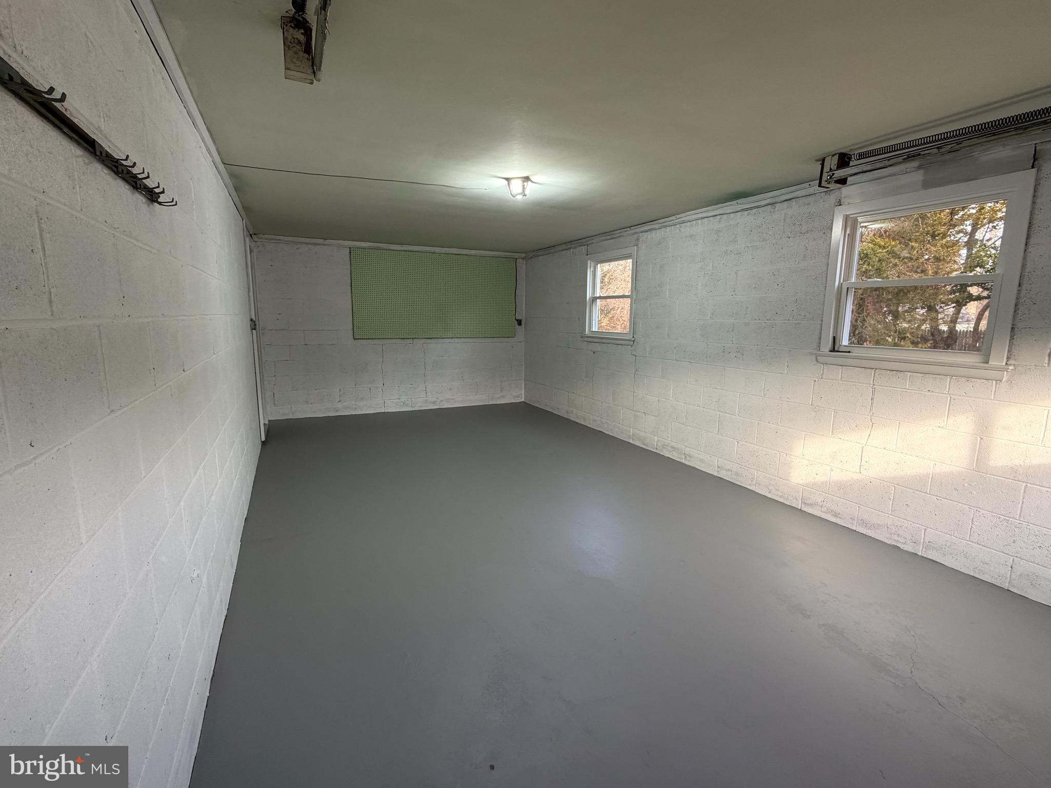 24 Rieck Avenue Millville, NJ 08332 - Photo 41 of 57 an empty room with a empty space and windows