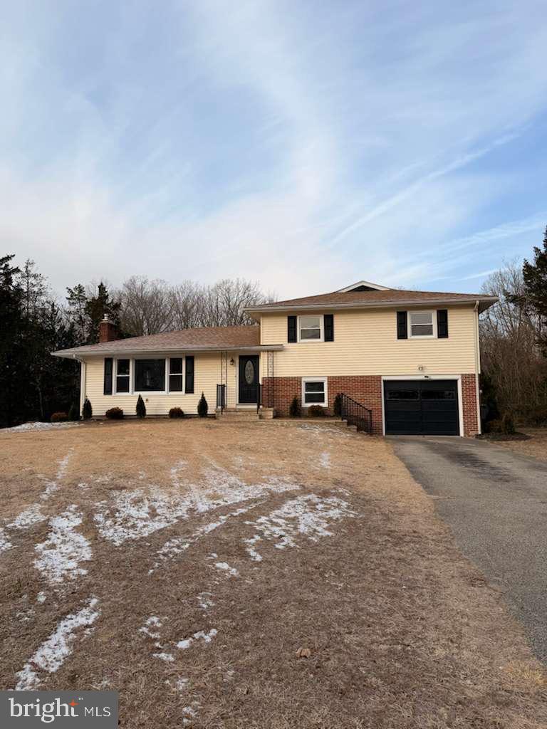 24 Rieck Avenue Millville, NJ 08332 - Photo 49 of 57 a front view of a house with a yard and garage
