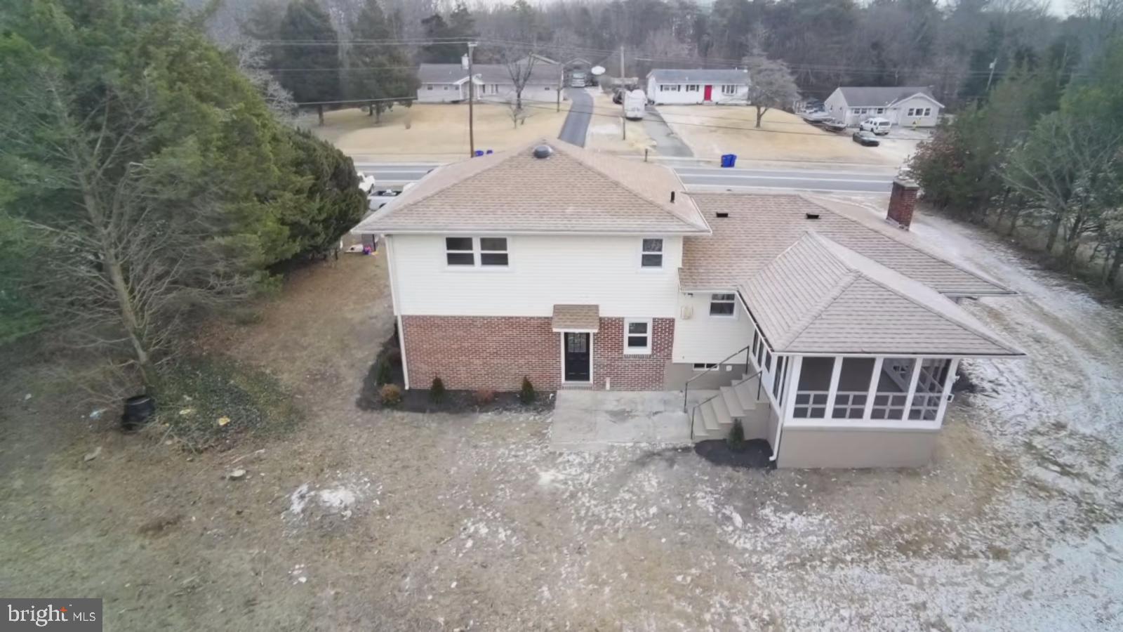 24 Rieck Avenue Millville, NJ 08332 - Photo 52 of 57 a view of a house with a yard and roof